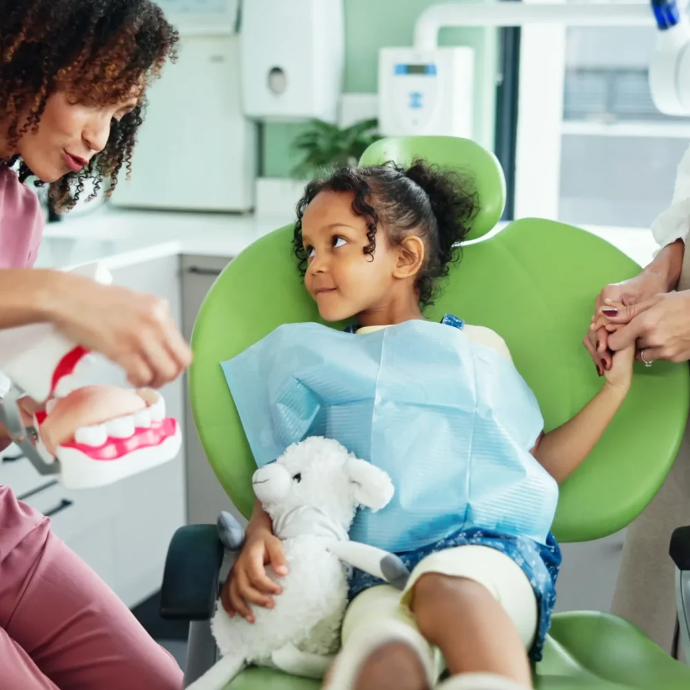 dentist-consulting-and-woman-with-child-in-clinic-2024-12-13-07-05-52-utc dentist-consulting-and-woman-with-child-in-clinic-2024-12-13-07-05-52-utc